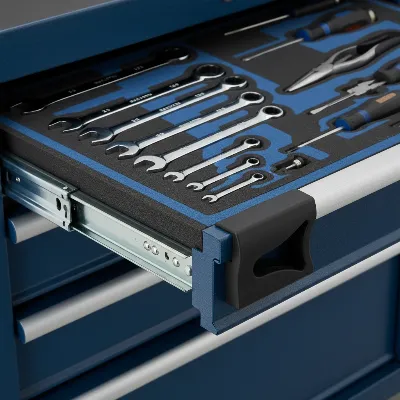 Close-up of a high-quality tool chest drawer, showing ball-bearing slides and foam liners.